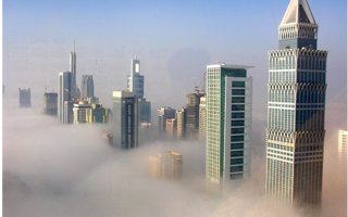Fabulous Images of Dubai Under the Fog | Fog at sunrise in Dubai - photographer Harry Lambert... If you’re down there, on the streets, probably is not so cool, but from this perspective looks amazing! Stunning photos!