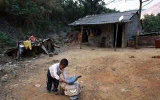 Sadness of Life | Long lives in a small village in Guangxi province. He was an orphan - and the mother and father died of AIDS. A-Long wouldn’t. By himself, he washes his laundry and makes his meals. Alone, he feeds the chickens and raises the dog. Alone, he studies and le